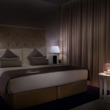 Damac Maison The Vogue Dubaj Zewnętrze zdjęcie A bedroom at the hotel