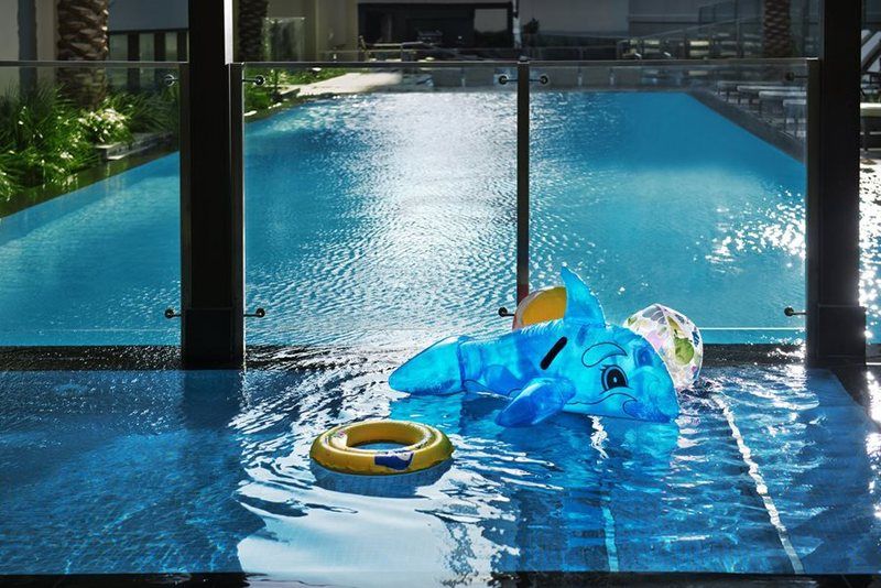 Damac Maison The Vogue Dubaj Zewnętrze zdjęcie The swimming pool at the Ritz-Carlton, Singapore