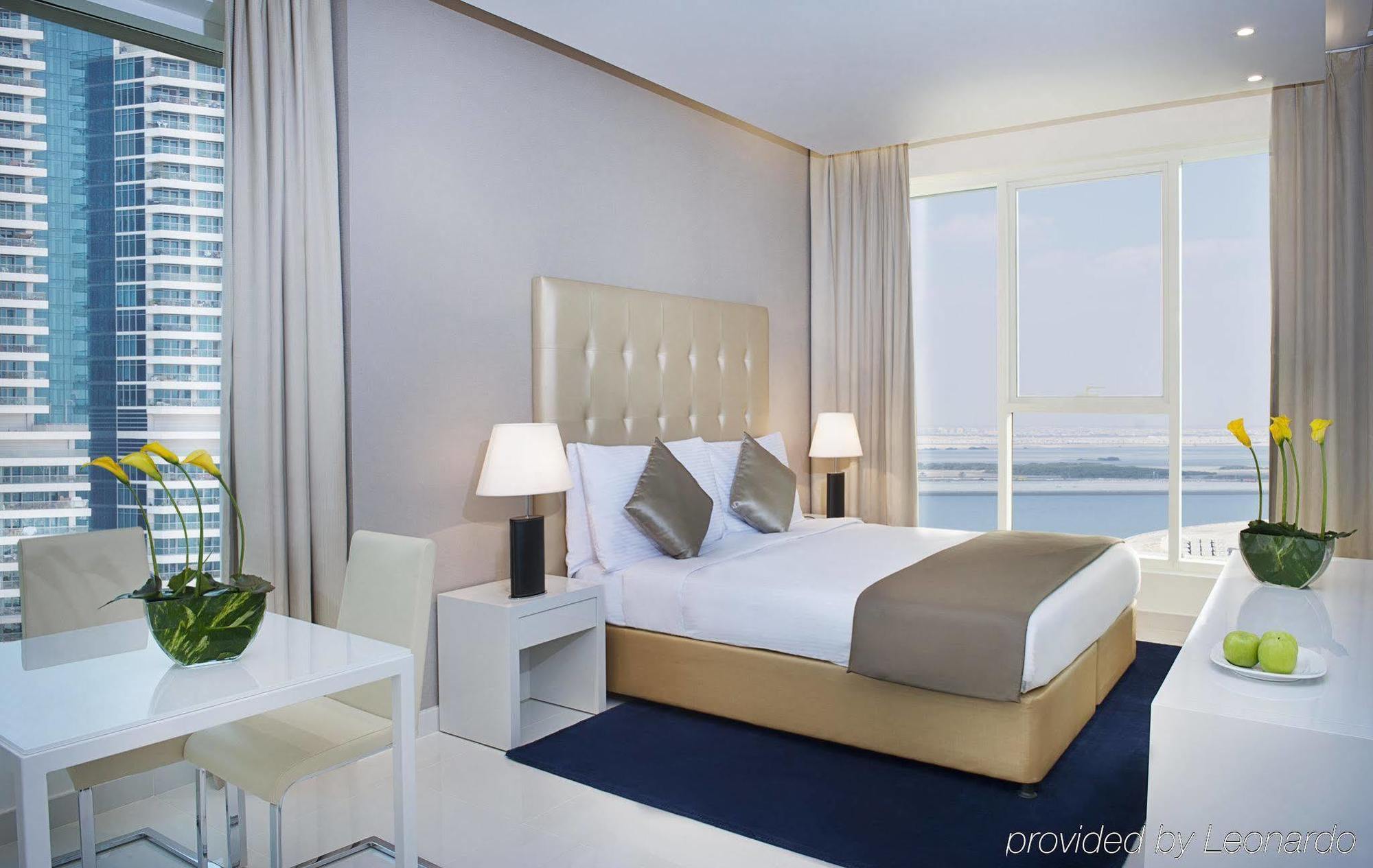 Damac Maison The Vogue Dubaj Zewnętrze zdjęcie A bedroom at the Address Downtown Hotel
