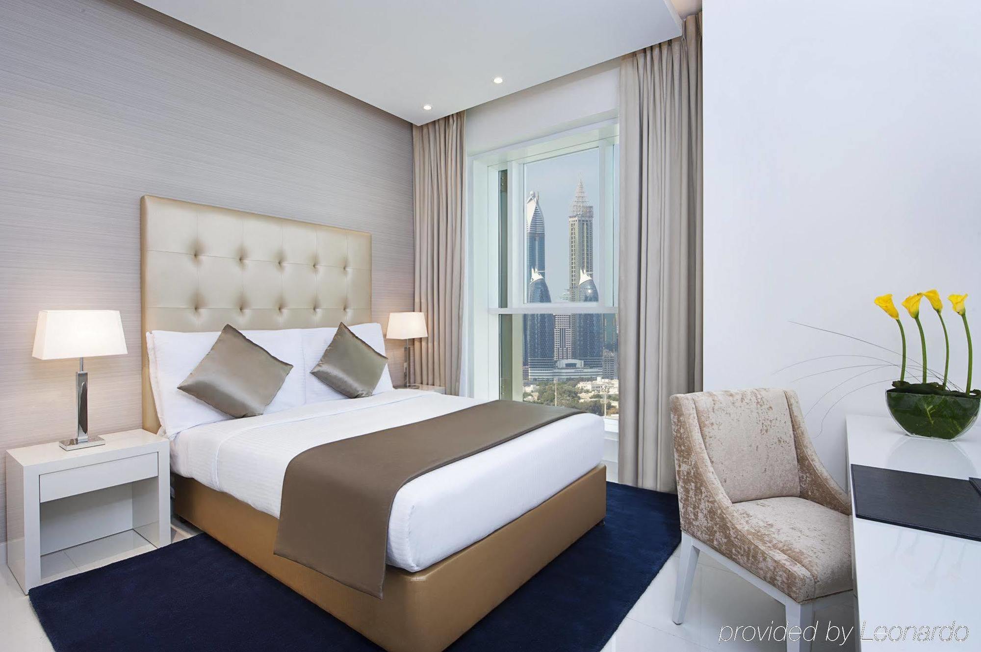 Damac Maison The Vogue Dubaj Zewnętrze zdjęcie A bedroom at the hotel