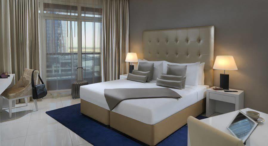 Damac Maison The Vogue Dubaj Zewnętrze zdjęcie A bedroom at the hotel
