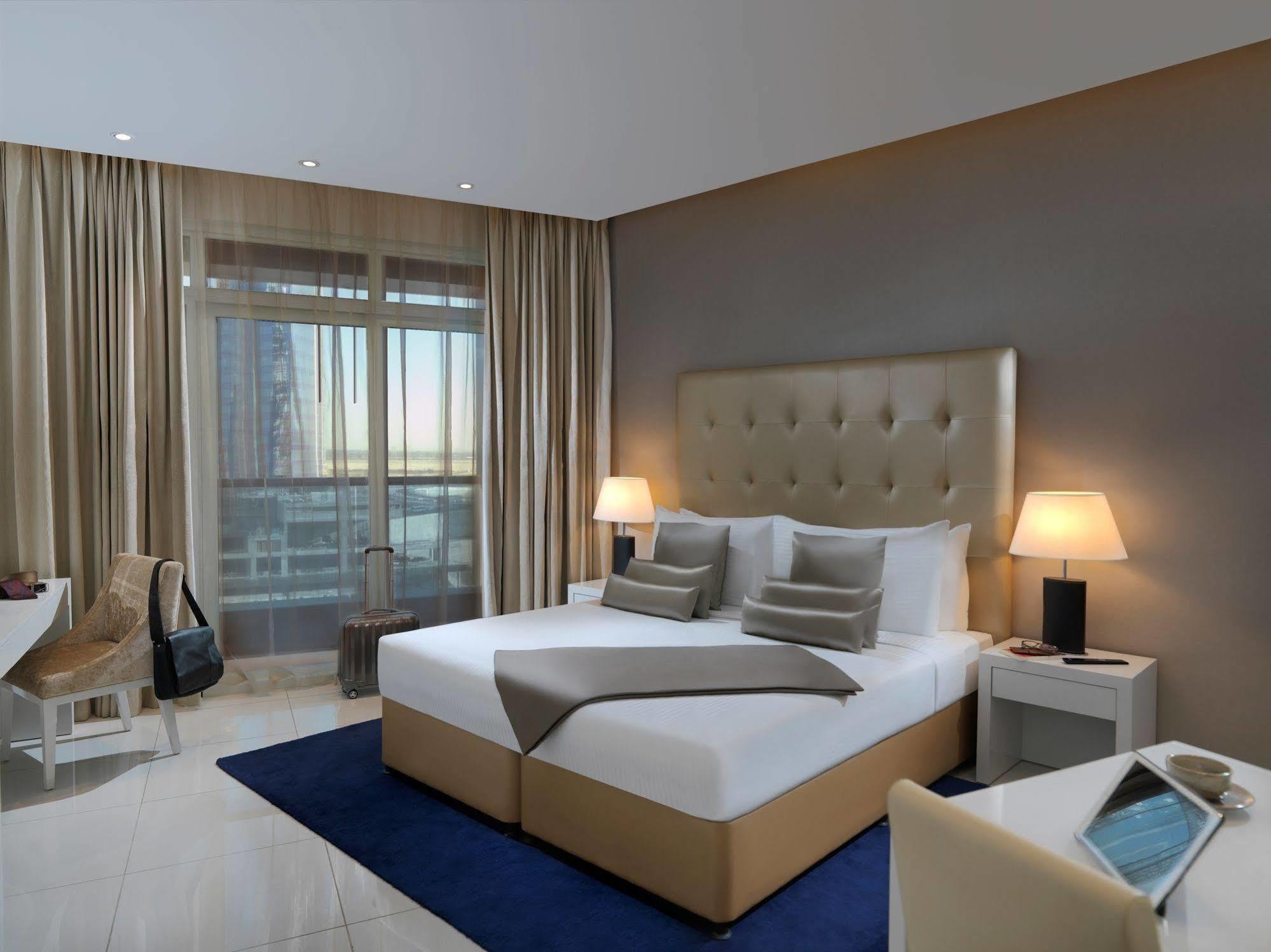 Damac Maison The Vogue Dubaj Zewnętrze zdjęcie A bedroom at the hotel